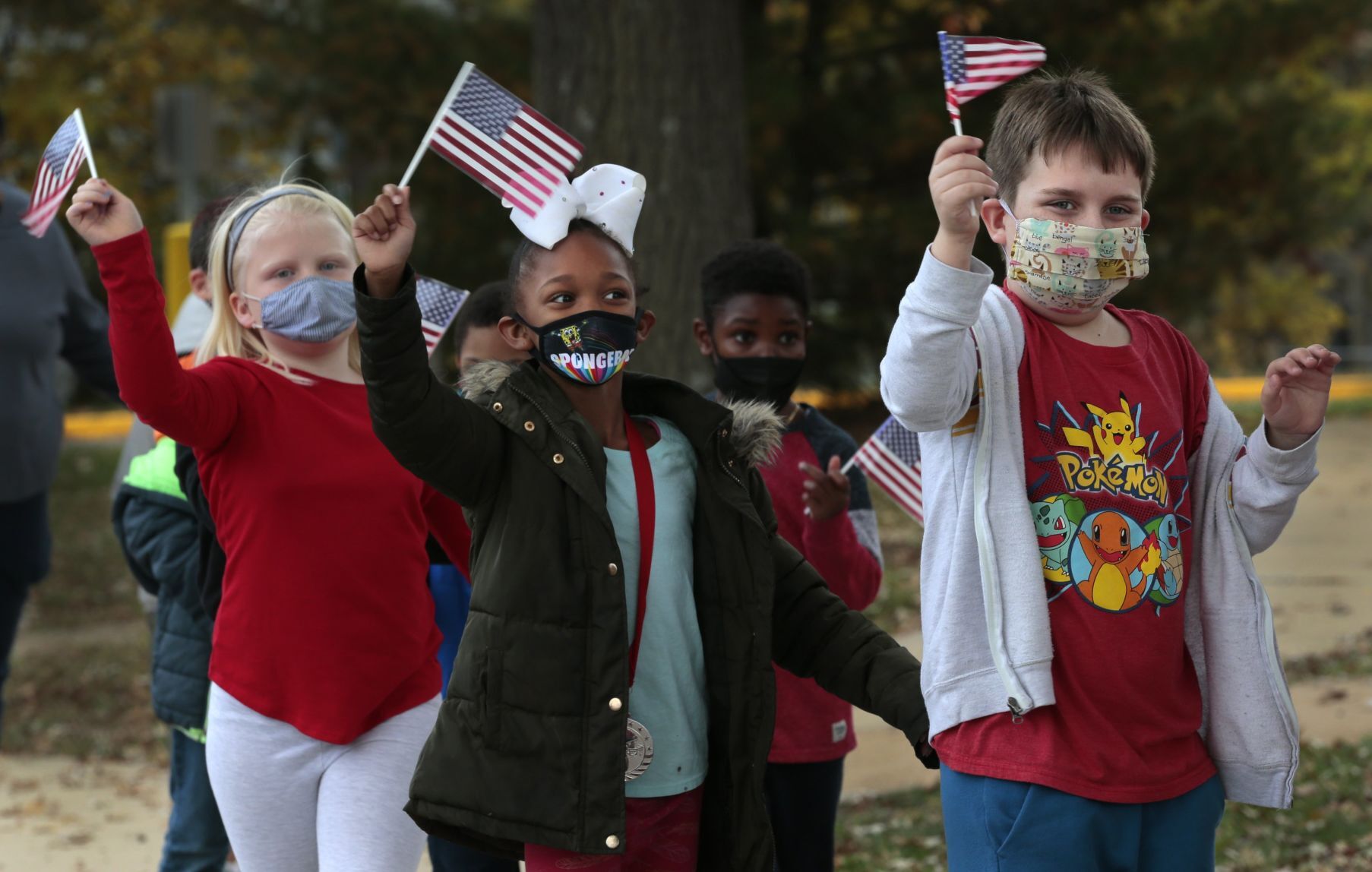 Students honor veterans with drive-by parade